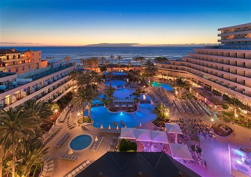 Hotel and swimming pools panoramic night view